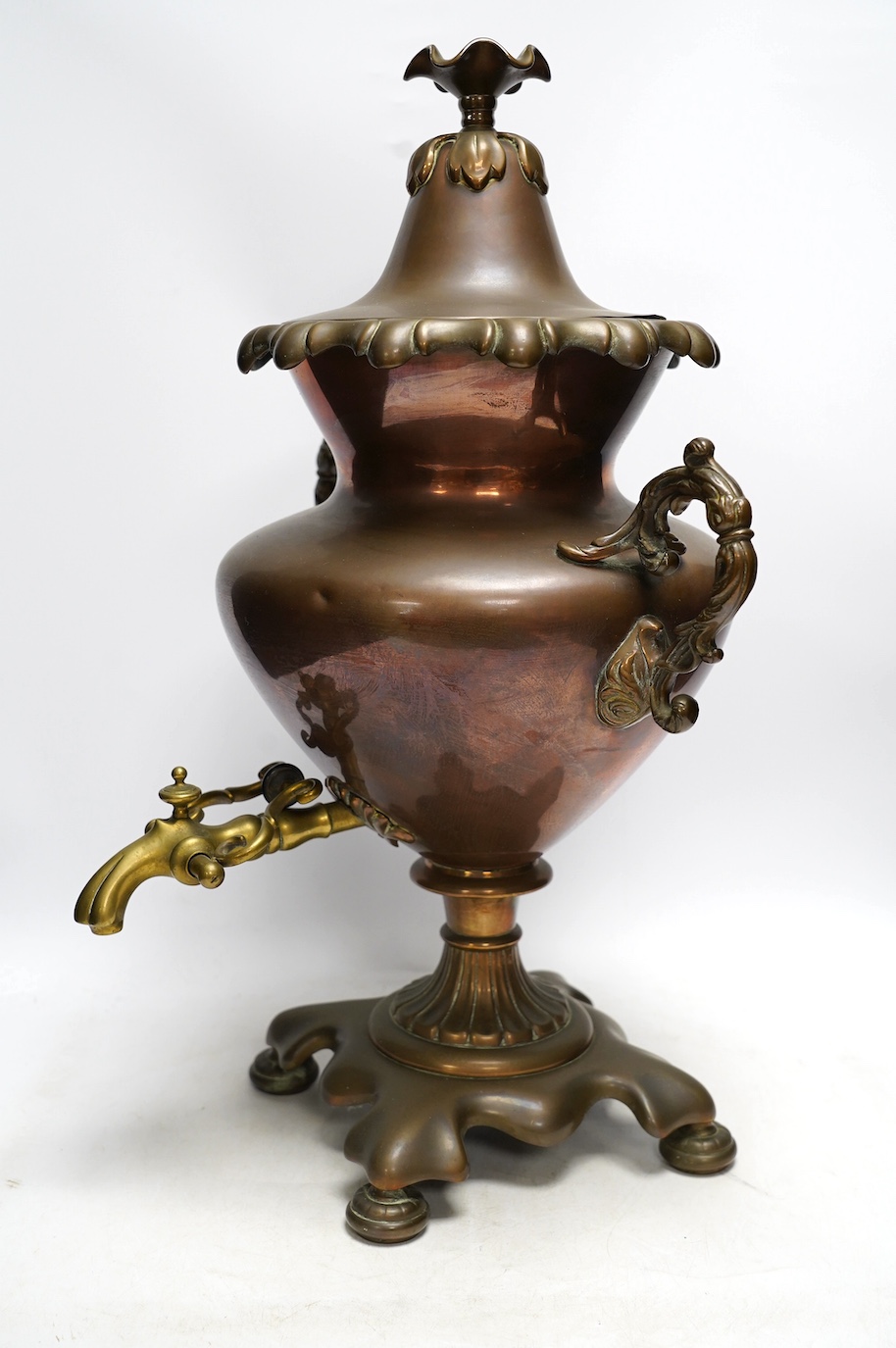 A Victorian copper and brass tea urn, 51cm. Condition - fair